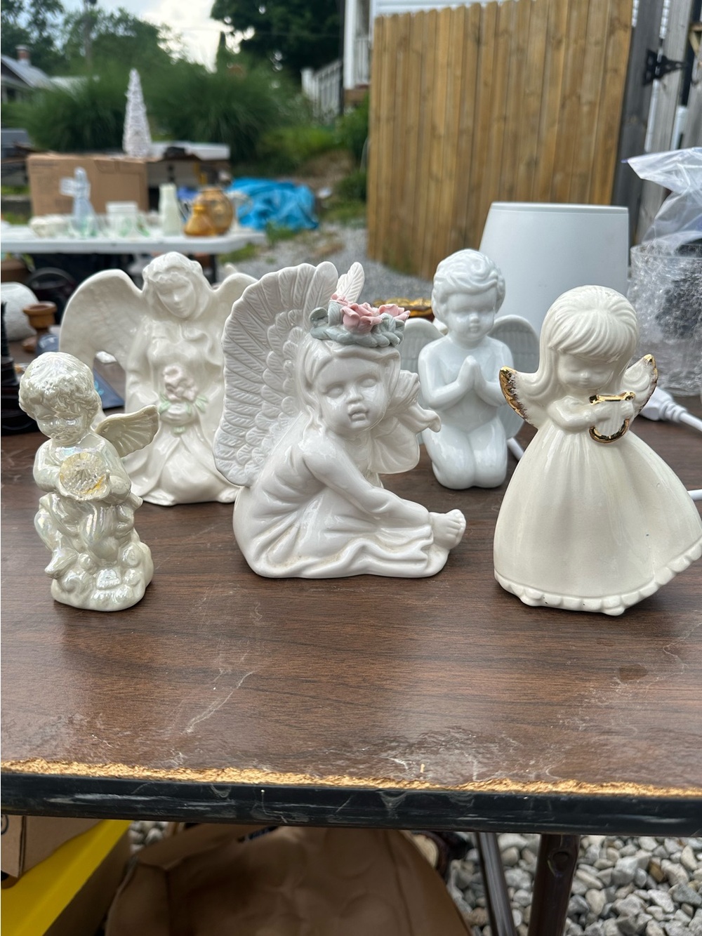 Collection of 5 ceramic angel/cherub figurines